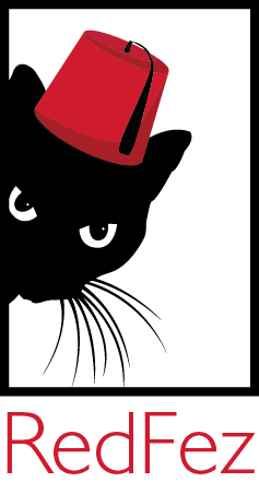 Black cat wearing a red fez